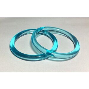 Vintage Pair of Transparent Blue Lucite Bangle Bracelets Round Profile Spacer